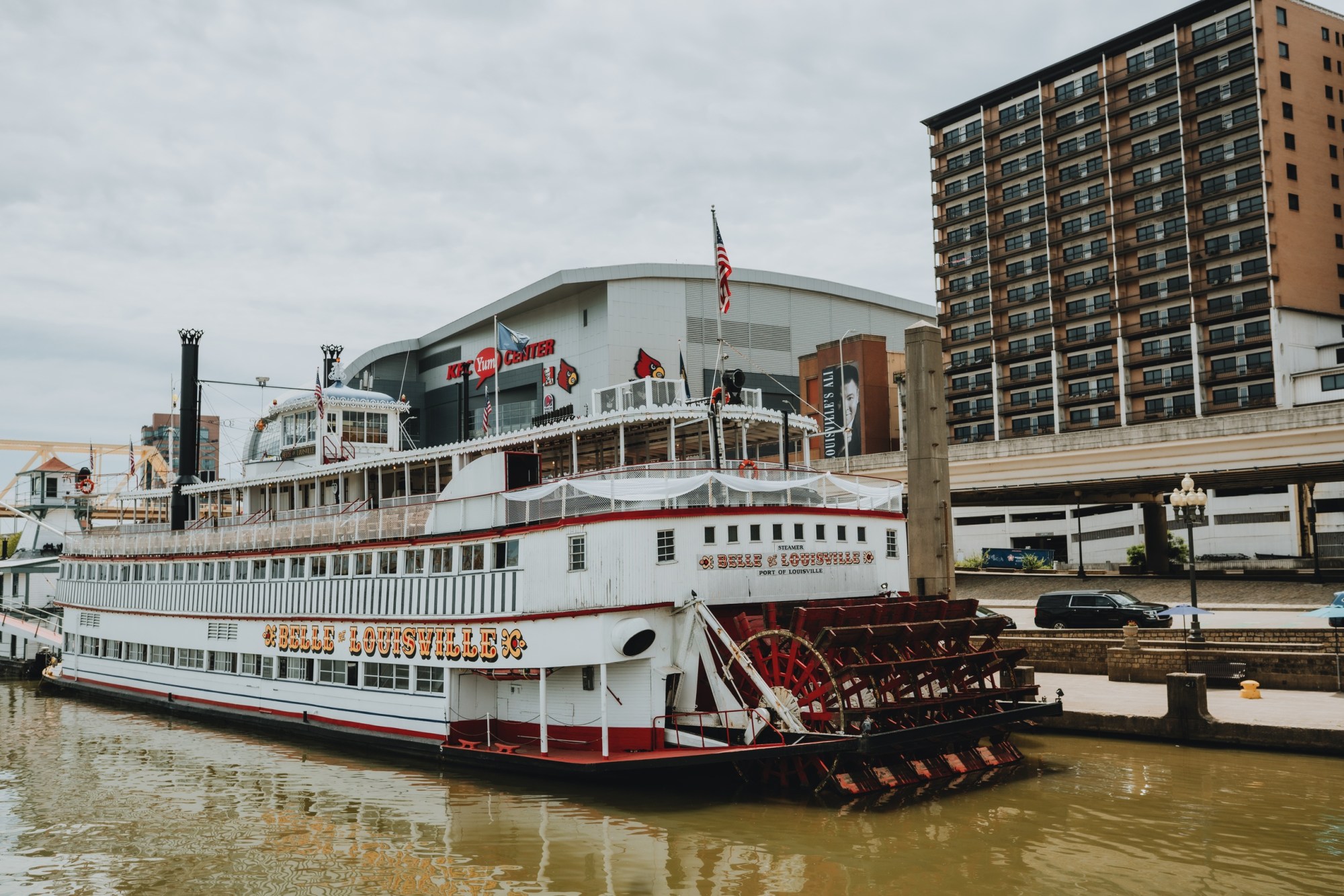 a boat is docked next to a large body of water