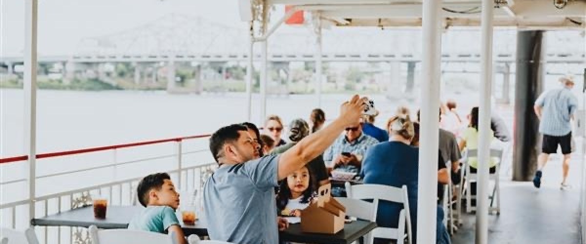 a group of people sitting at a table