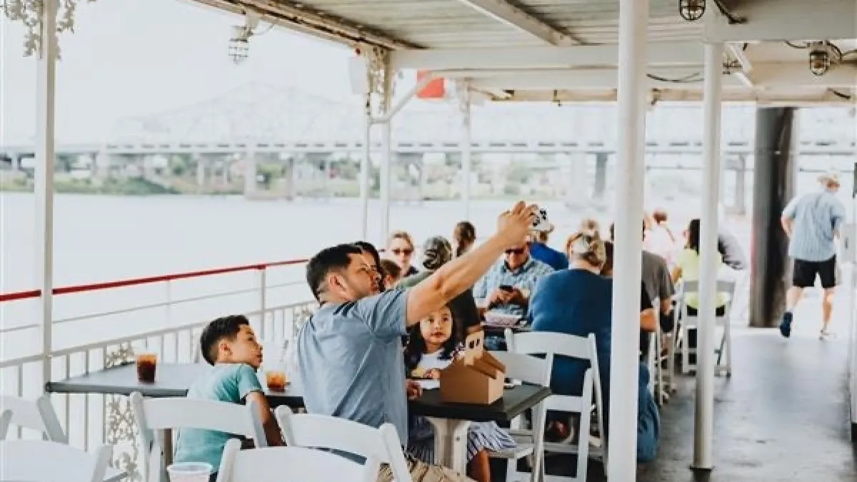 a group of people sitting at a table