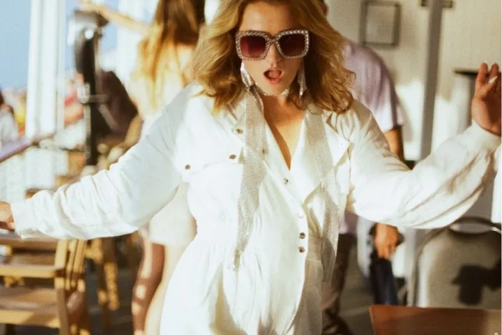 a woman sitting on a table