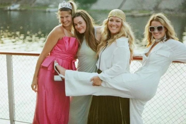 a group of people posing for the camera