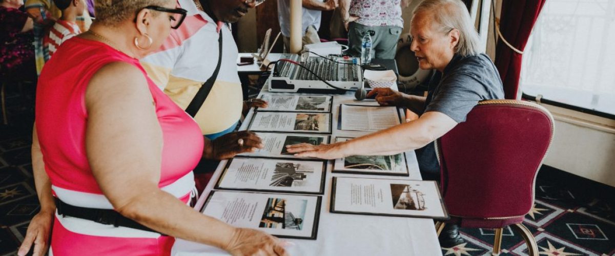 a group of people sitting at a table