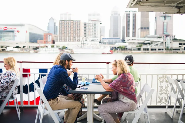 a man and a woman sitting on a bench