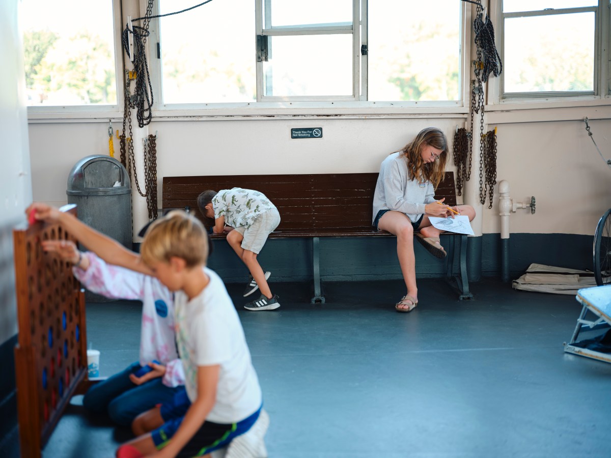 Children working on Adventure Passports